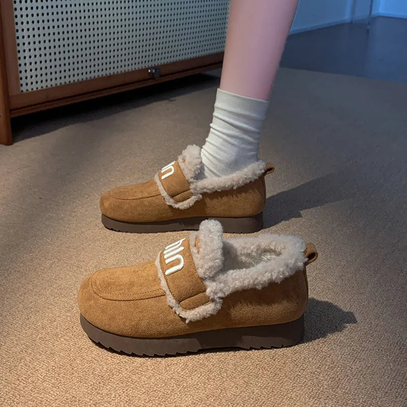 Faux fur suede slip-on footwear with round toe design, stylish and comfortable from Trendsi.