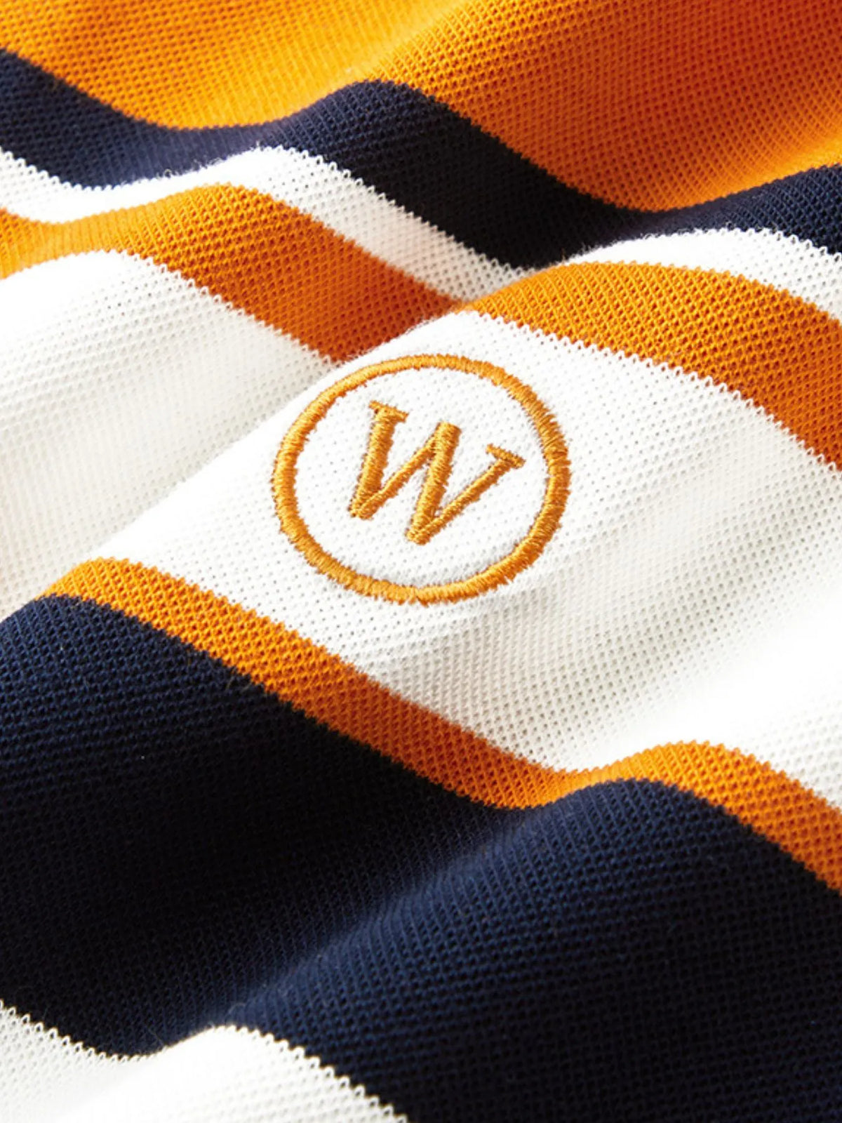 Men's plus size color block striped polo shirt from Trendsi, featuring short sleeves and bold horizontal stripes.