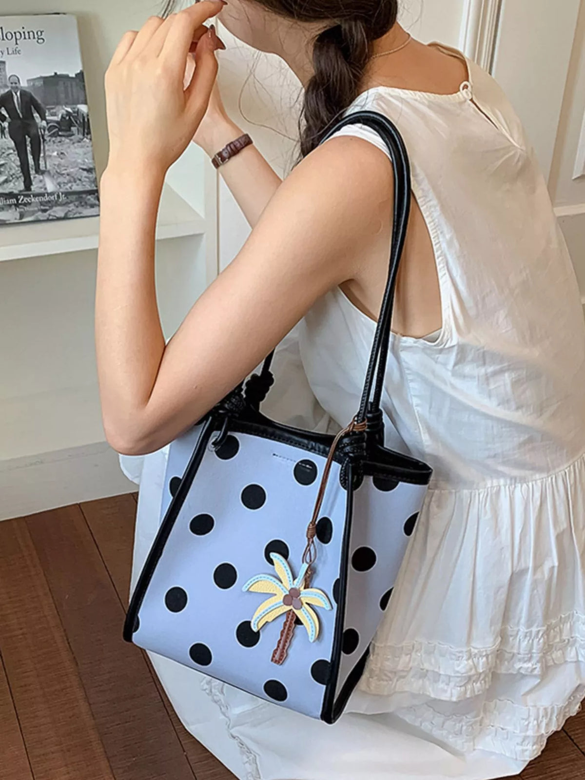 Polka dot shoulder handbag from Plush Fashion Hub featuring a stylish design and spacious interior.