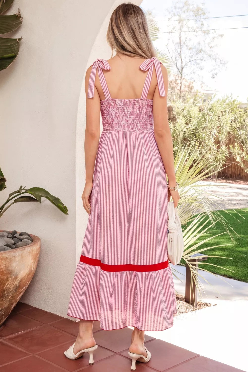 Plush Fashion Hub stripe bow knot straps high waist maxi dress with contrast trim and ruffle hem, featuring a stylish and elegant design.