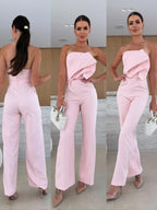 Candy-colored FitiqueFit bodycon halterneck backless jumpsuit with high waist and wide-leg design, perfect for casual wear.