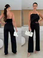 Candy-colored FitiqueFit bodycon halterneck backless high-waist wide-leg jumpsuit, casualwear with vibrant style and flowing silhouette.