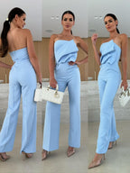 Candy-colored FitiqueFit bodycon halterneck backless jumpsuit with high waist and wide-leg design, perfect for casualwear.