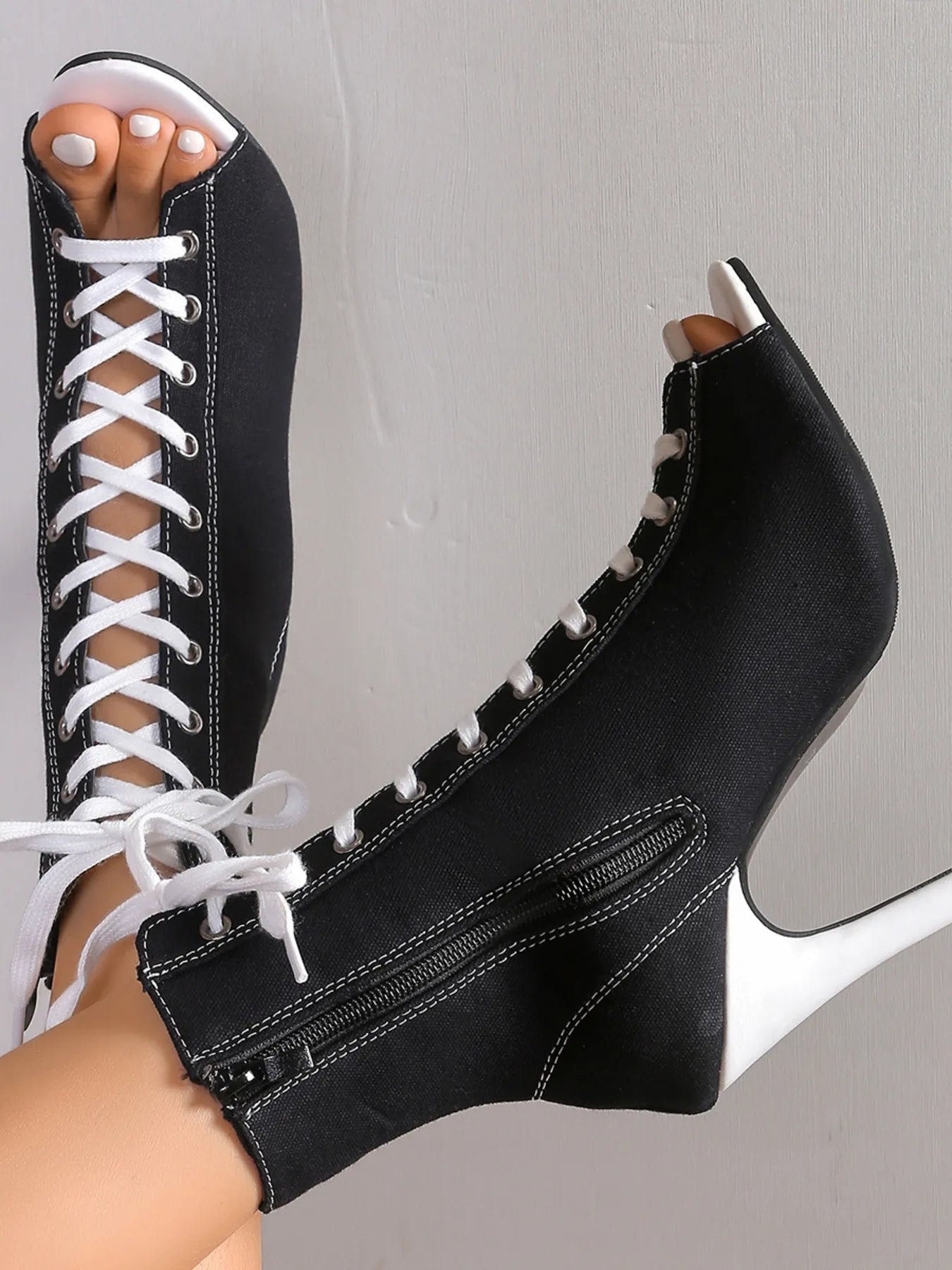 Trendsi canvas lace-up peep toe stiletto ankle boots with cutout design and high heels, stylish and modern footwear.