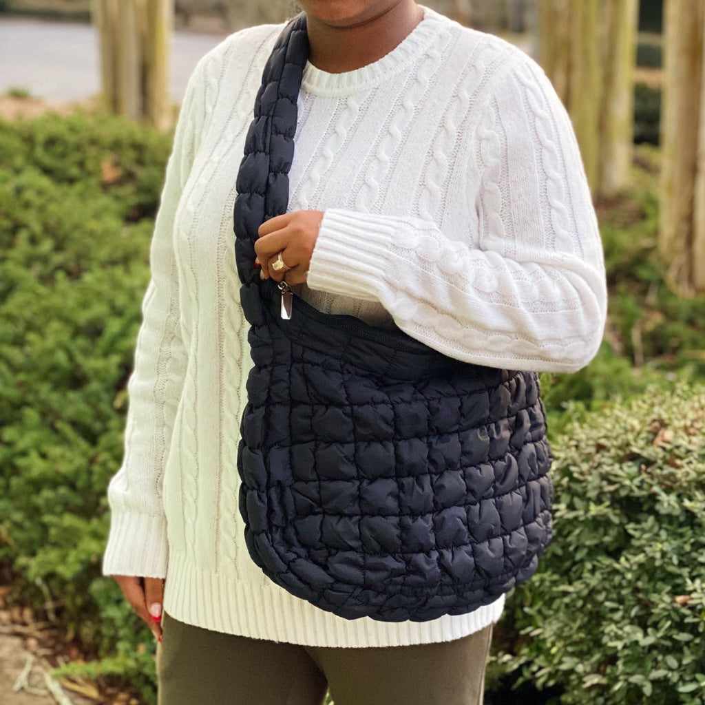LadyShow.Store quilted cross body bag with multiple compartments and adjustable strap, designed for versatile everyday use.