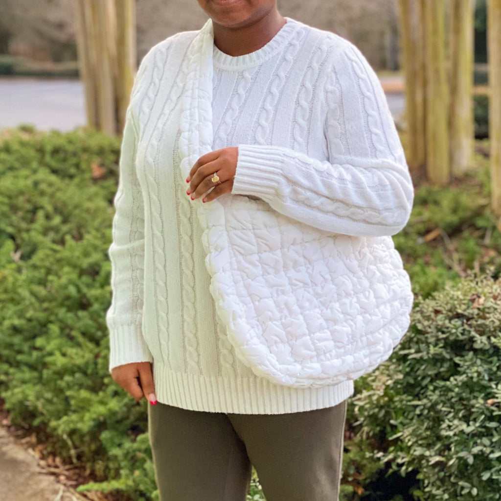 LadyShow.Store quilted cross body bag with adjustable strap and multiple compartments, designed for stylish everyday use.