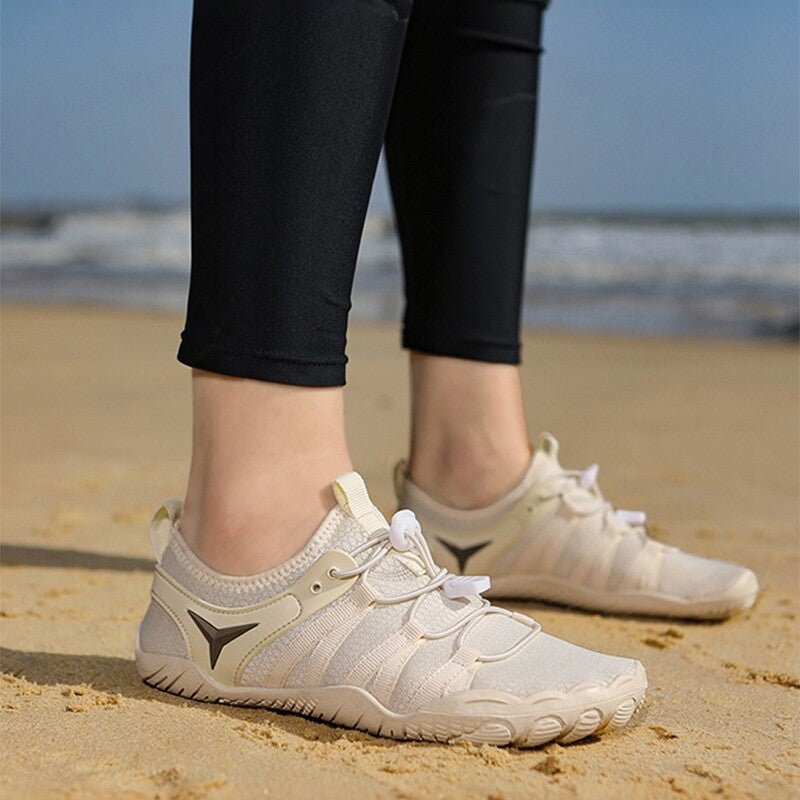 Casual breathable barefoot shoes for men and women by FitiqueFit, ideal for beach wear, showing lightweight, flexible footwear.