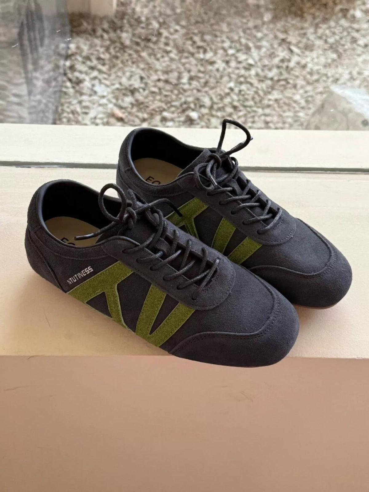 Women's casual suede and nylon lace-up flat sneakers from Plush Fashion Hub, featuring a comfortable and stylish shoe design.