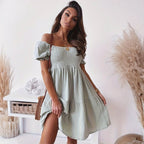 Casual FitiqueFit one-word collar puff sleeve mid dress with wrinkle fabric, perfect for relaxed, stylish everyday wear.