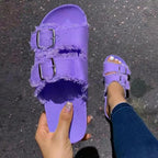 Casual solid canvas denim flat slippers with buckle detail, designed for comfortable everyday wear.