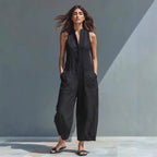 Casual women's sleeveless jumpsuit with buttoned stand collar and loose fit, by FitiqueFit, perfect for relaxed everyday wear.