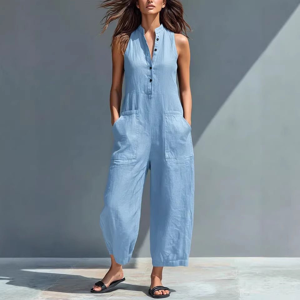Casual women's sleeveless jumpsuit with buttoned stand collar and loose fit by FitiqueFit, shown on a model.