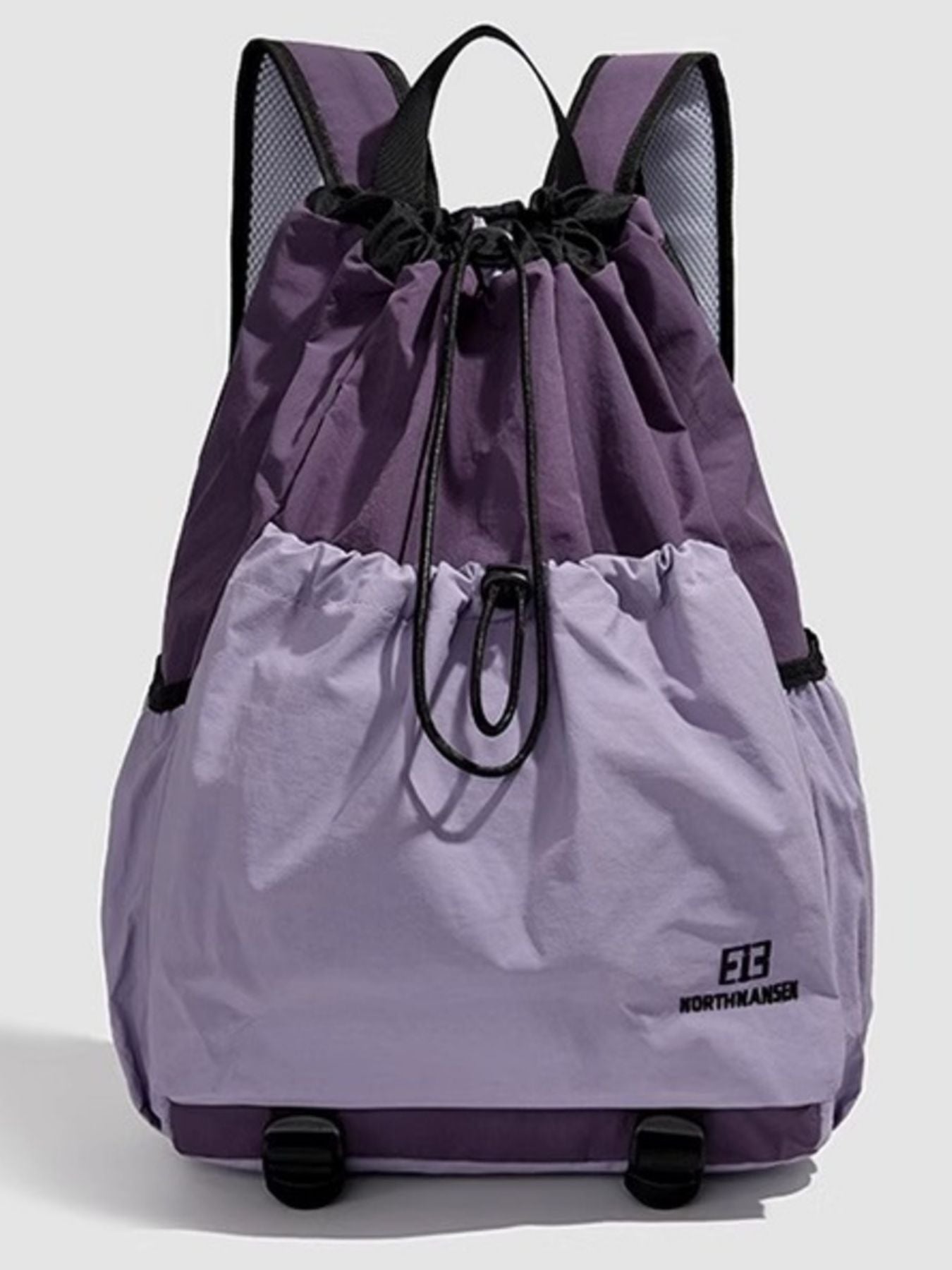 Lightweight nylon drawstring backpack for women, minimalist travel bag with adjustable straps and simple design.