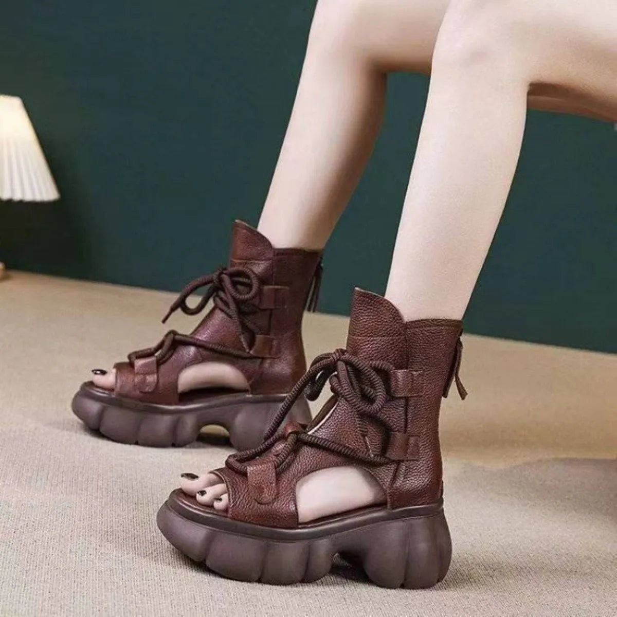 Chunky platform lace-up sandals from Trendsi featuring thick soles and ankle ties, perfect for casual or trendy summer outfits.