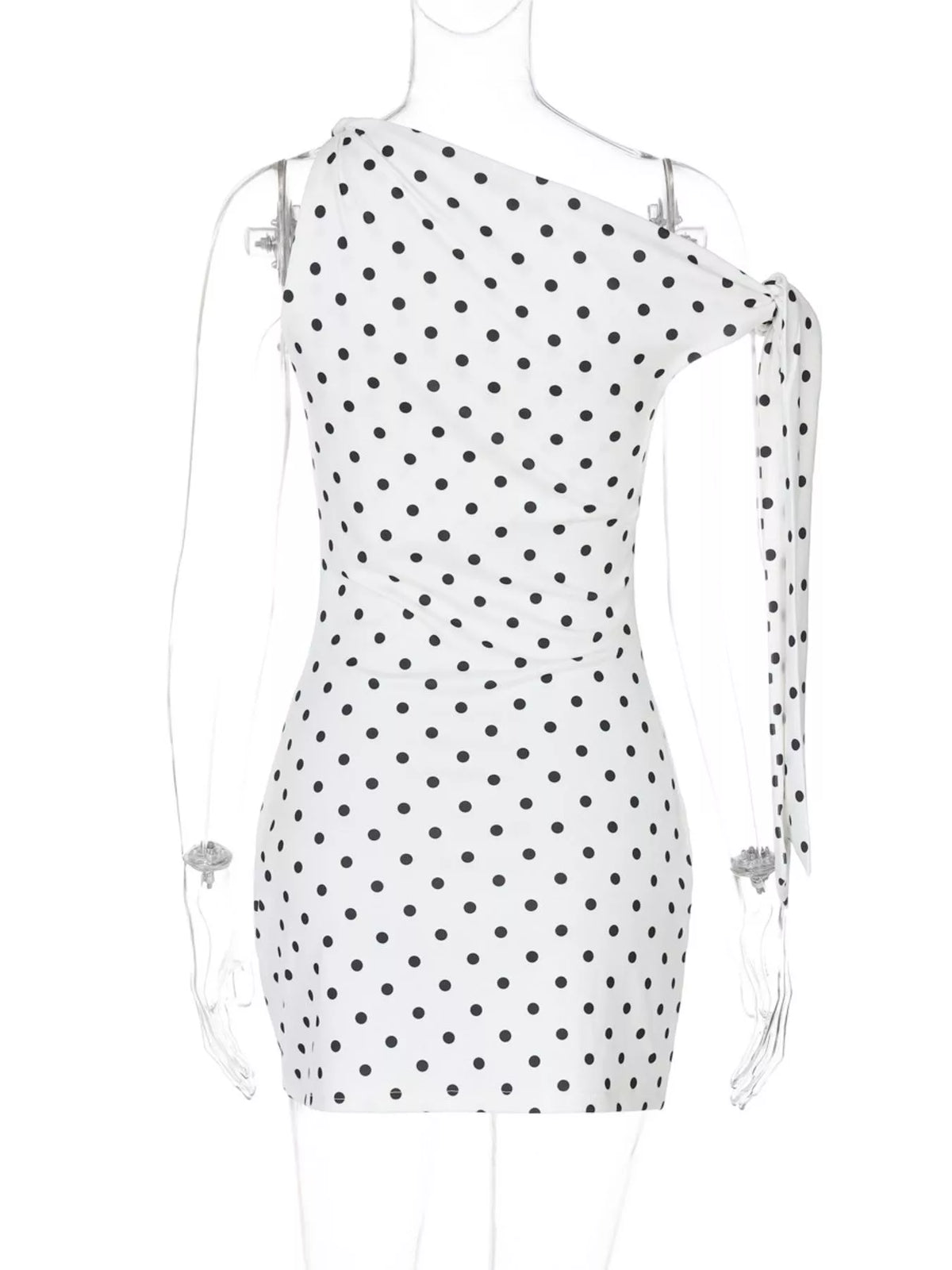 Polka dot sleeveless mini dress with bow accents by Plush Fashion Hub, featuring a fitted bodice and playful design.