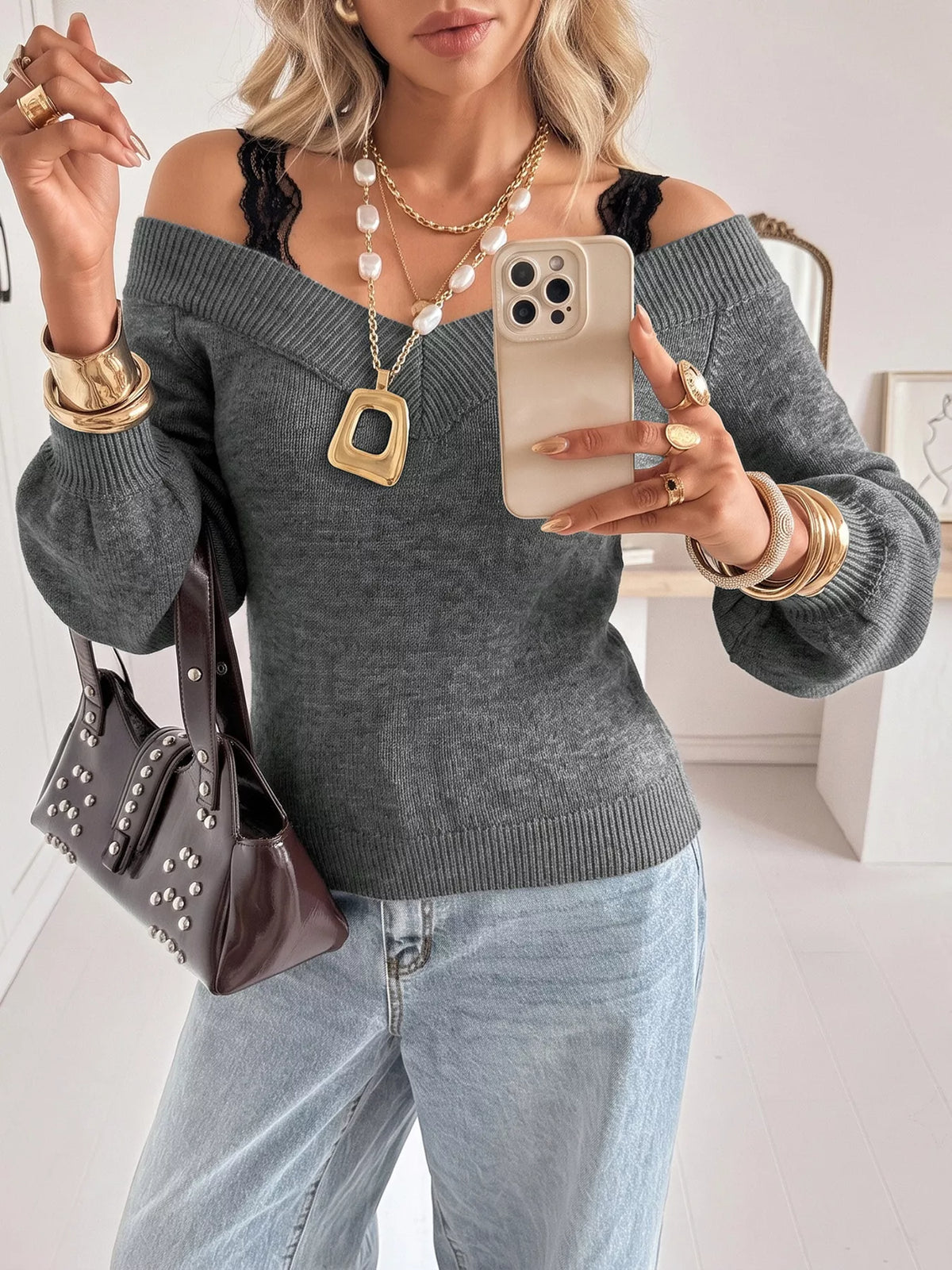 Off-shoulder lace trim sweater by Plush Fashion Hub, featuring a cozy knit design with delicate lace accents on the shoulders.