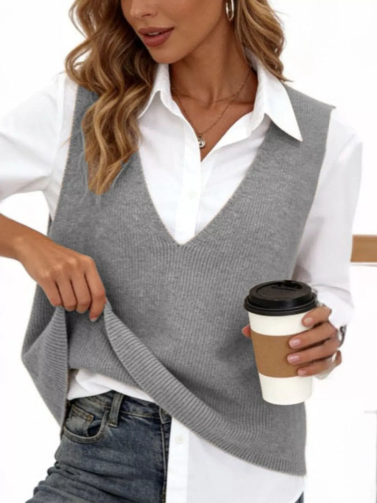 Plus size full V-neck sleeveless knit sweater vest by Trendsi, featuring a soft, textured knit fabric and a relaxed fit.
