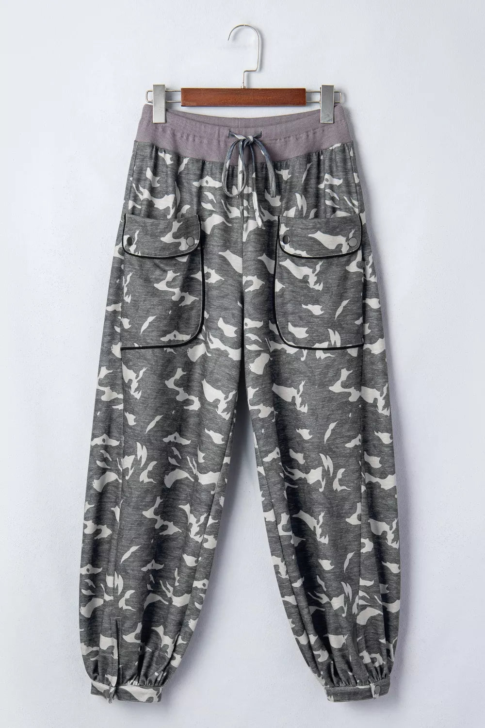 Multicolour camouflage cargo pants with drawstring waist and contrast waistband, stylish barrel pants by Plush Fashion Hub.