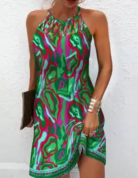 Women's printed sleeveless hollow dress by Trendy Attic Store01 featuring a stylish, flowy design and vibrant pattern.