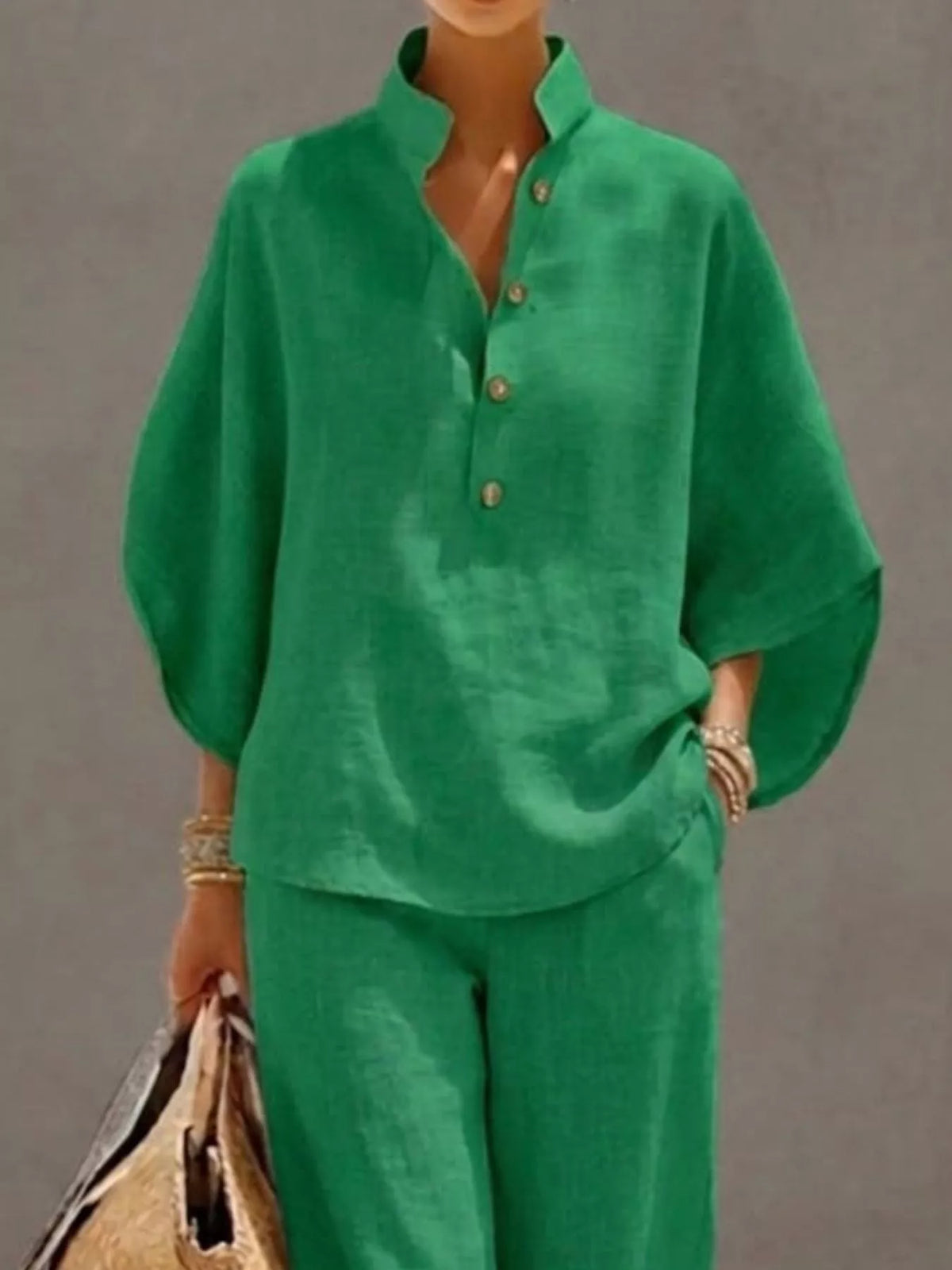 Plus size women's two-piece dress set with button detail, 3/4 sleeves, and matching pants from Plush Fashion Hub.