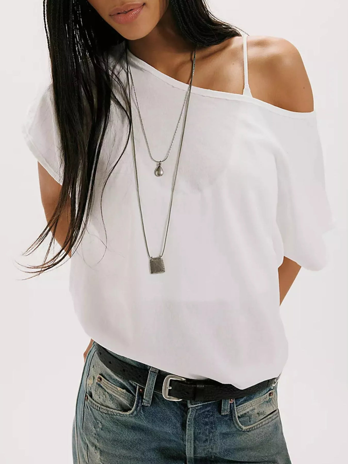 Solid color one-shoulder t-shirt from Plush Fashion Hub, stylish tops with a single shoulder design, casual and trendy silhouette.
