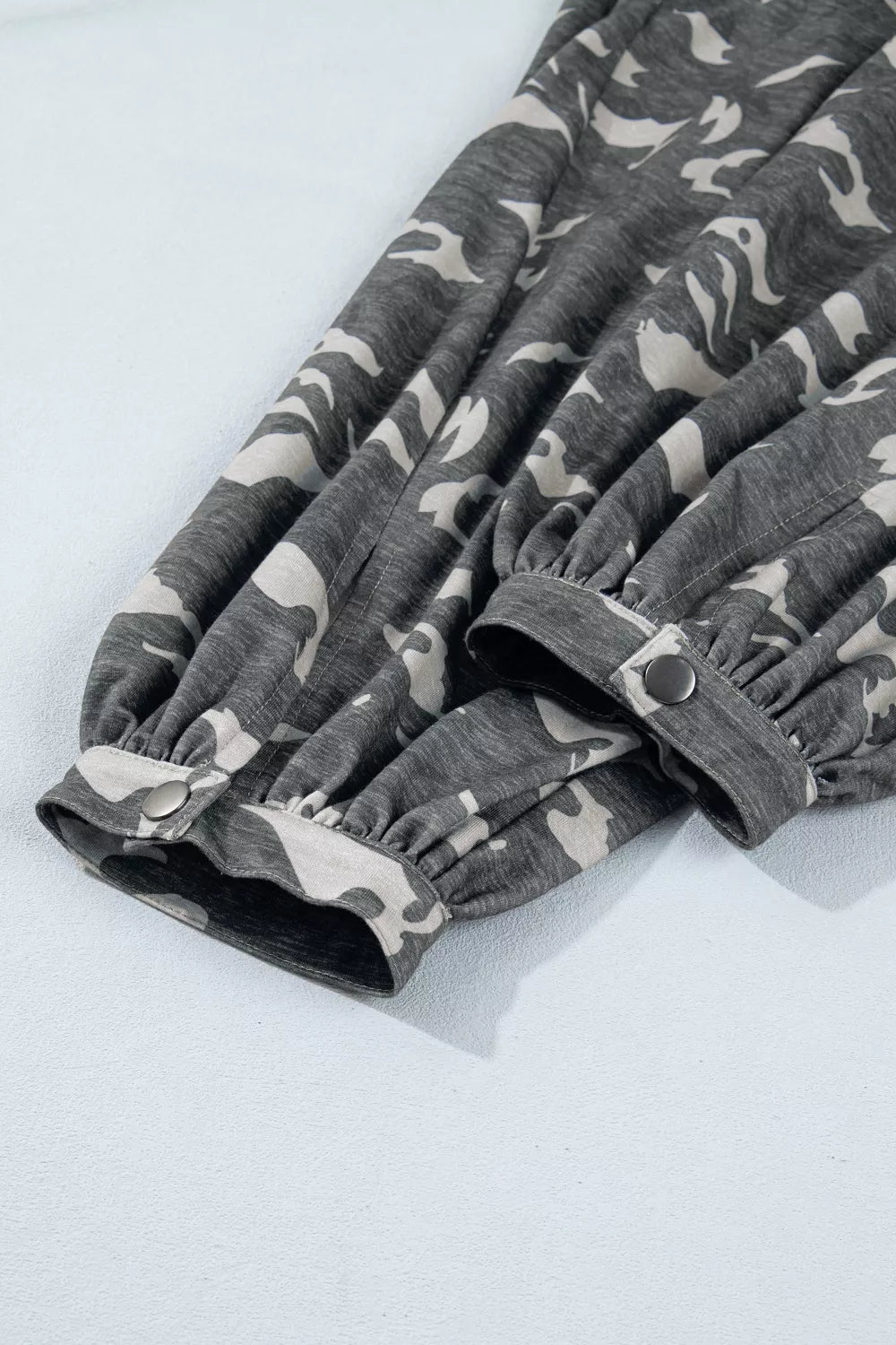 Multicolour camouflage cargo barrel pants with contrast waistband and drawstring from Plush Fashion Hub, shown flat on white background.