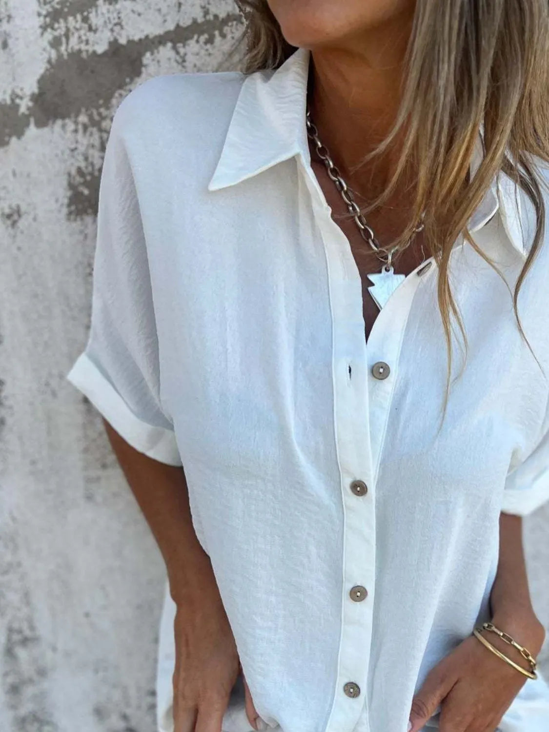 Women's collared button-down office blouse with half sleeves in a stylish top from Plush Fashion Hub.