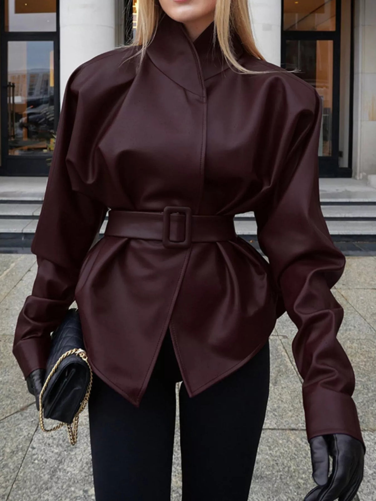 Women's faux leather jacket with stand collar and belt, stylish and trendy Trendsi women's jacket shown in the image.