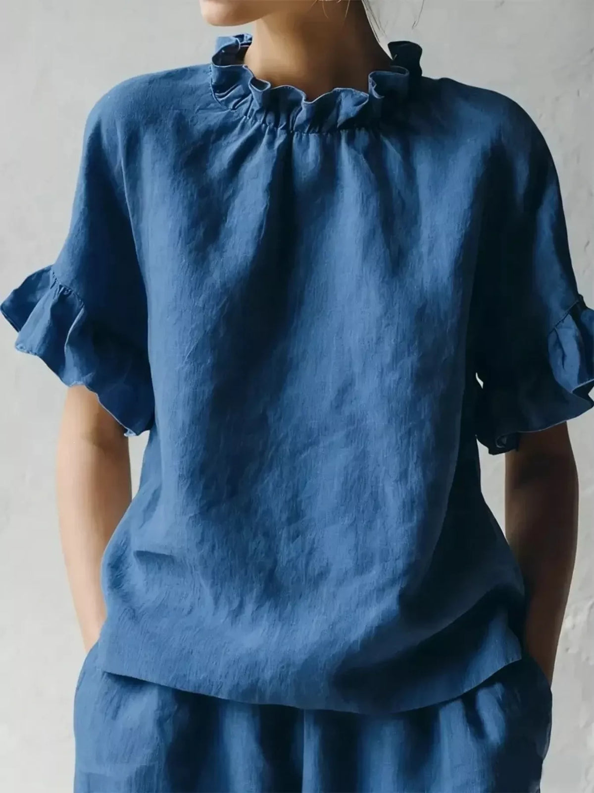 Plus size ruffled neck blouse with half sleeves, stylish full-size blouse by Plush Fashion Hub displayed on a model.