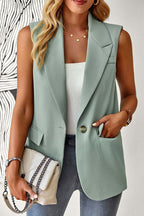 Women's sleeveless open-front blazer vest by FitiqueFit, featuring a tailored fit, lapel collar, and stylish workwear design.