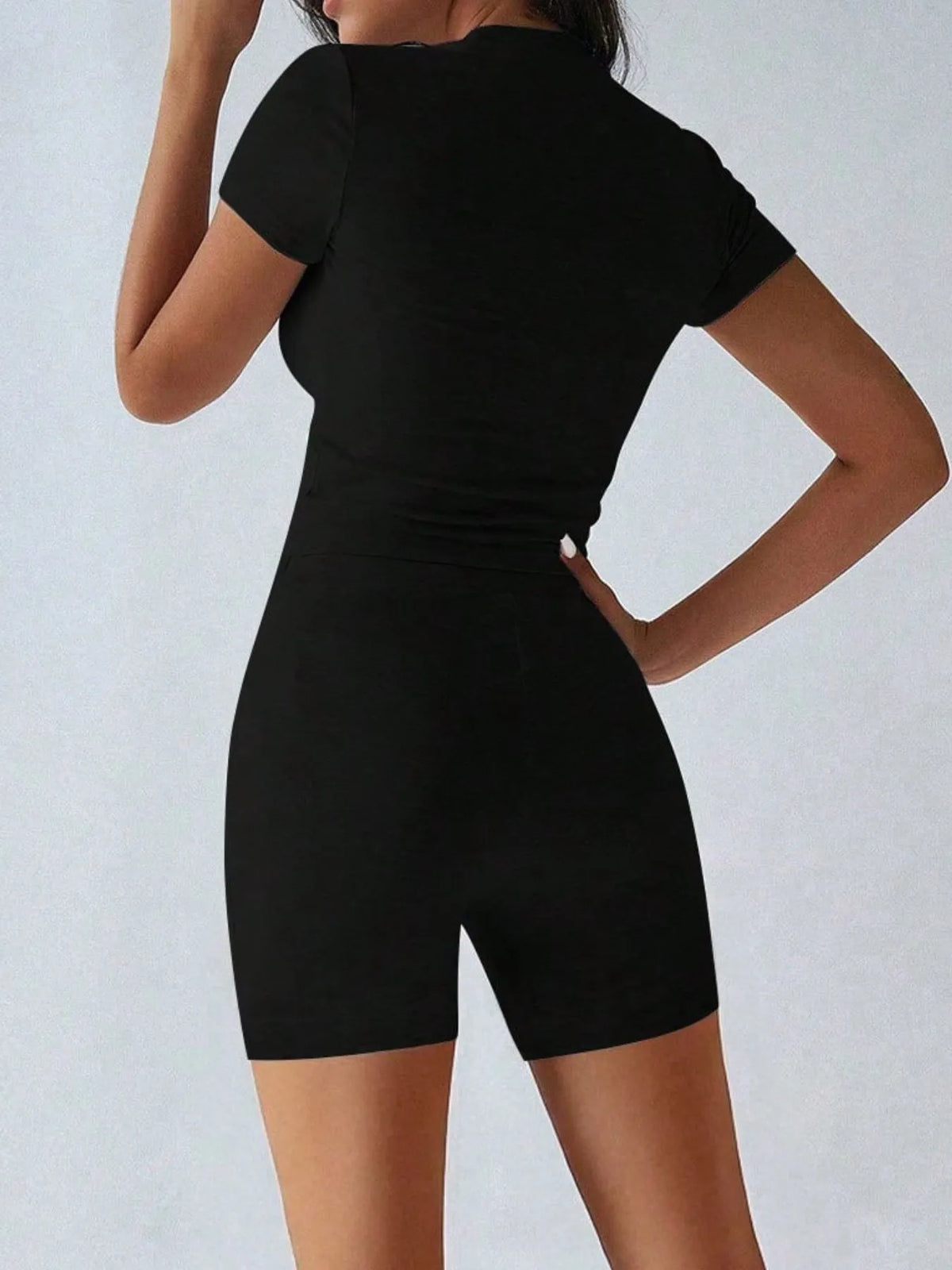 Plush Fashion Hub active wear set with round neck short sleeve top and matching shorts, ideal for workout or casual wear.