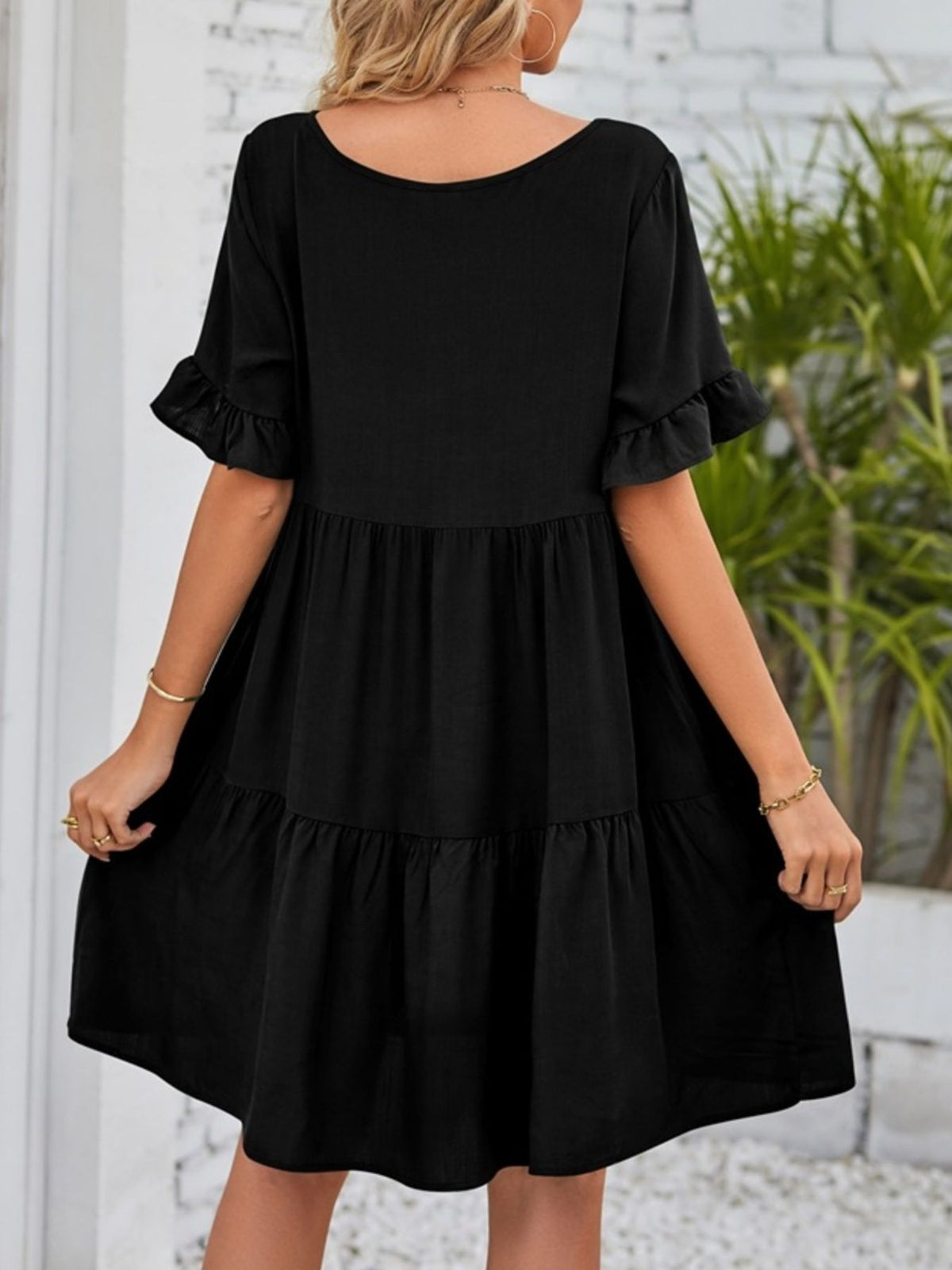 Lightweight rayon ruffled sleeve tiered mini dress with pockets from Plush Fashion Hub, featuring a flowy design and playful ruffle details.