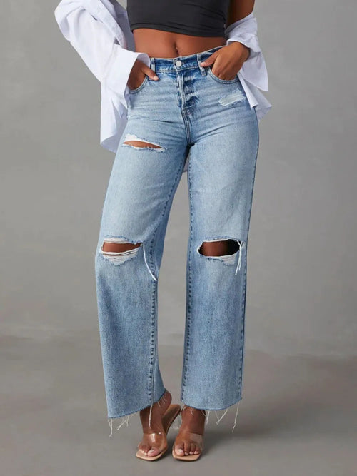 Distressed straight-leg denim jeans with pockets from Trendsi, showing a casual fit and distressed details on light-wash denim.