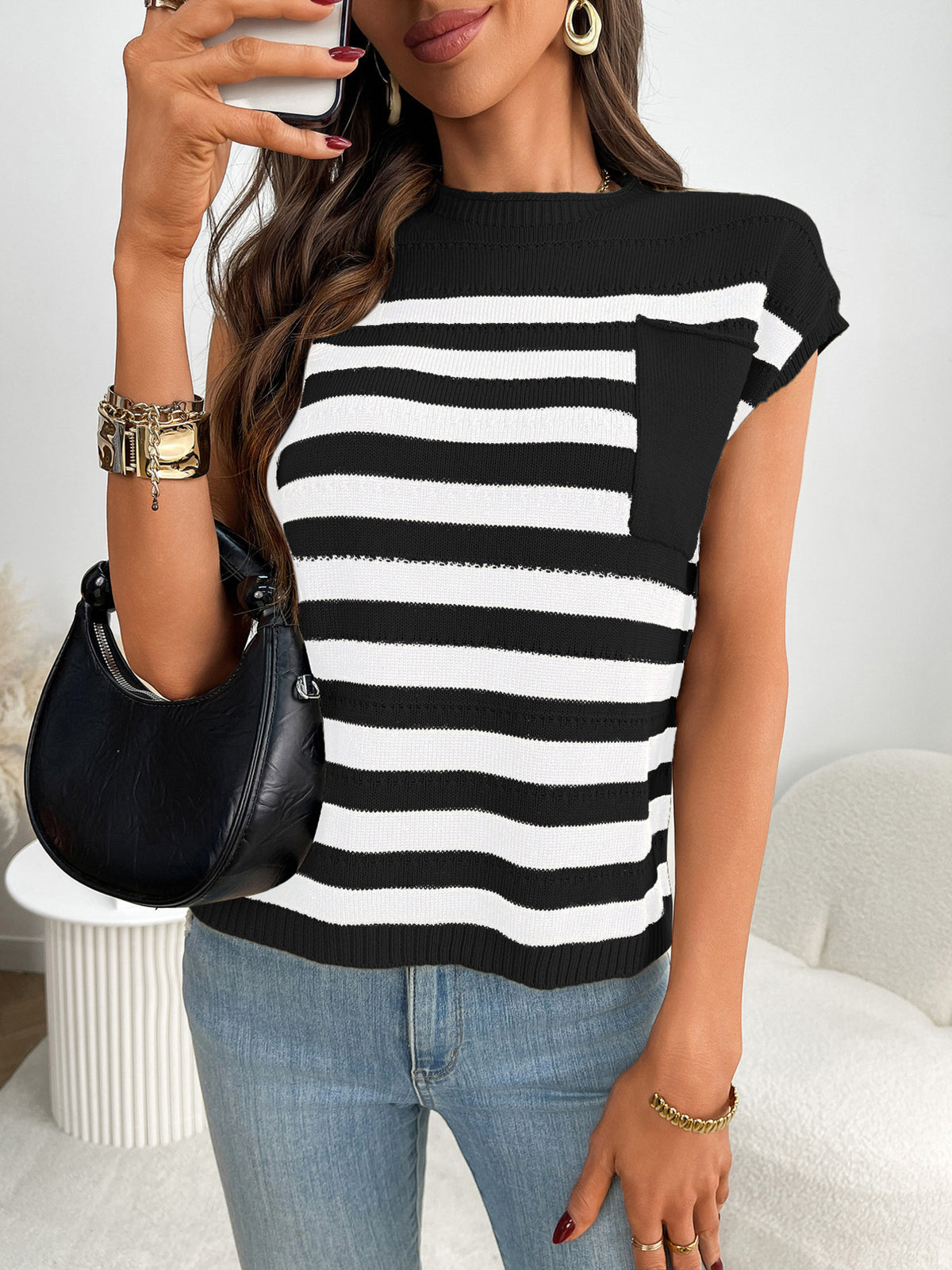 Women’s striped knit cap sleeve sweater with pocket detail, cozy outerwear by Plush Fashion Hub, shown in natural fabric texture.