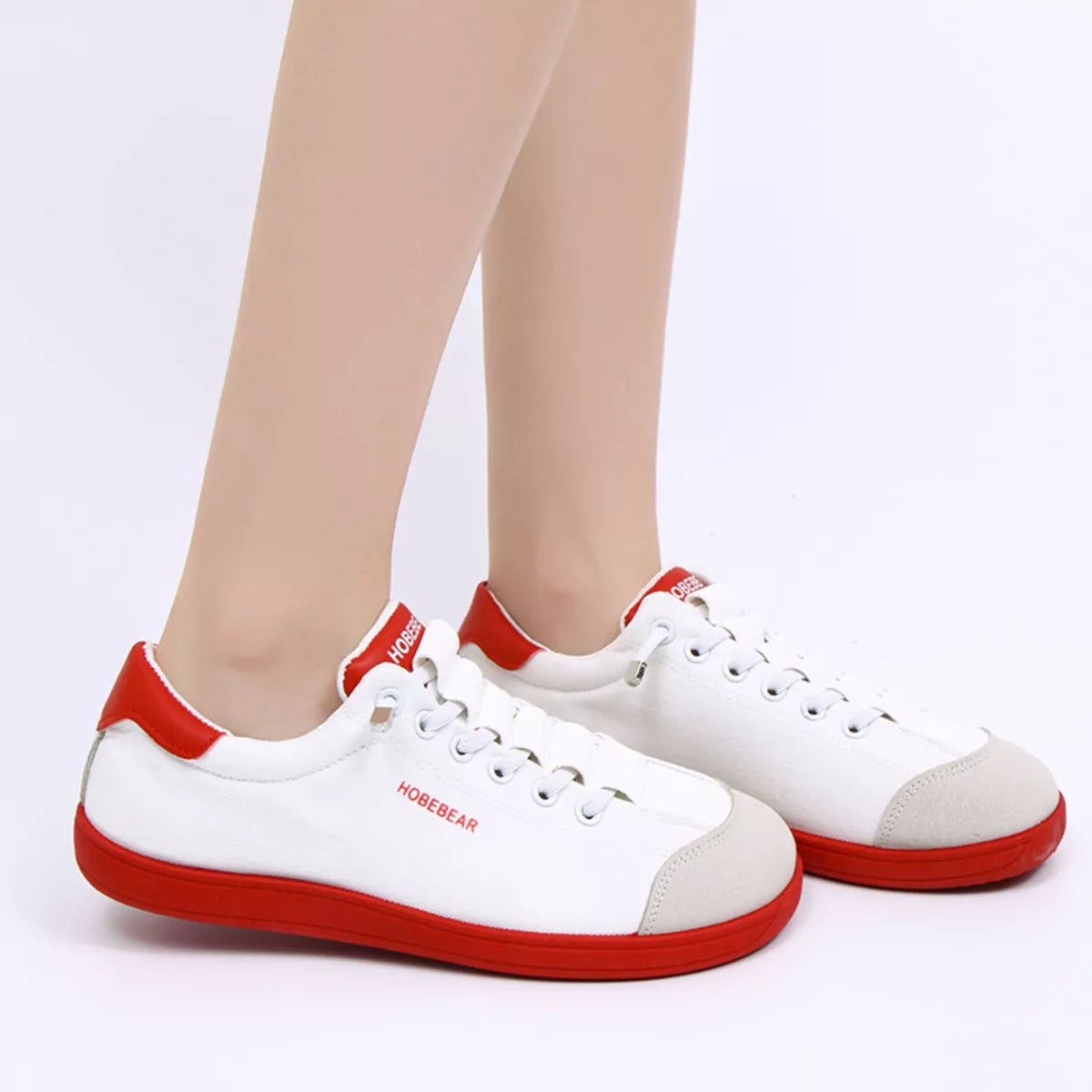 Contrast lace-up casual sneakers in PU leather and canvas by Plush Fashion Hub, showing stylish design and mixed material upper.