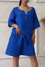 LadyShow.Store cotton-linen shirt set with high-waisted loose shorts for women, featuring a casual, breathable top and relaxed fit shorts.