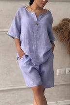 Cotton-linen shirt set with high-waisted loose shorts for women, featuring a relaxed fit and casual summer style.