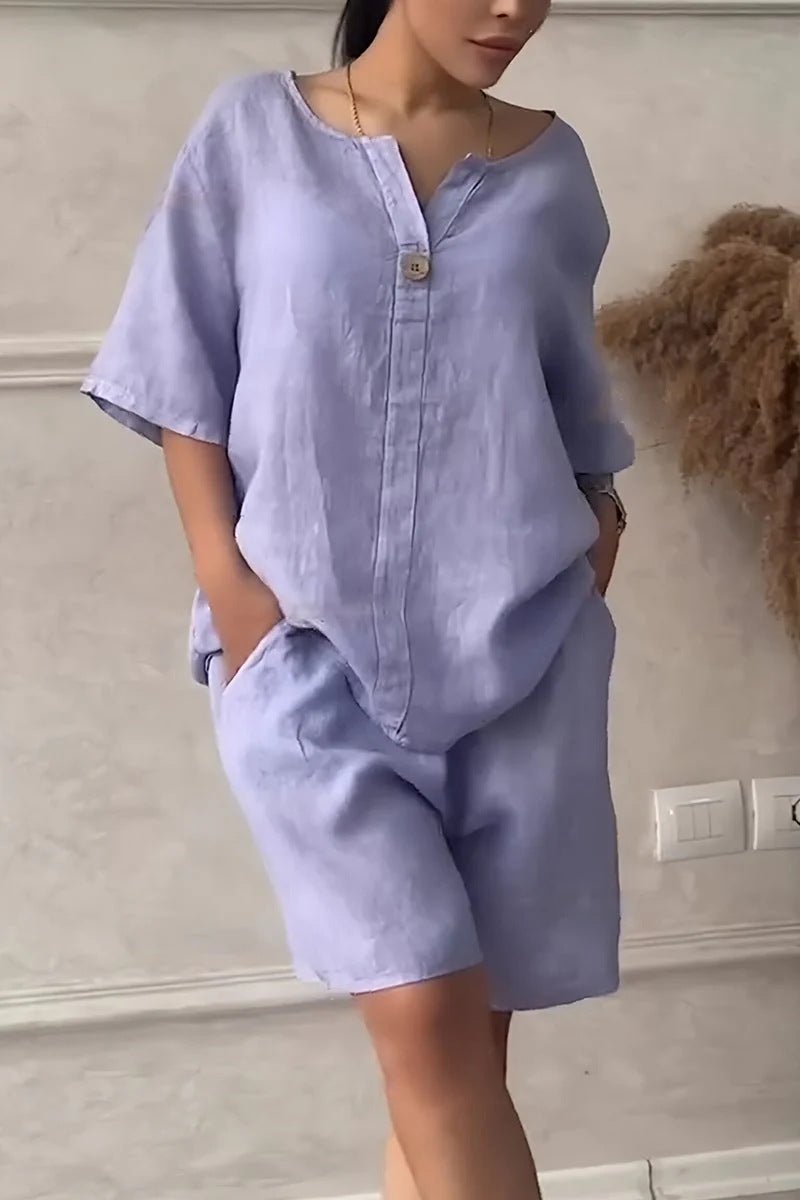 Cotton-linen shirt set with high-waisted loose shorts for women, featuring a relaxed fit and casual summer style.