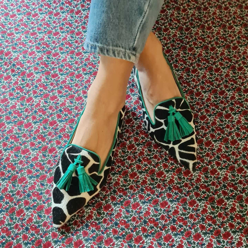 Cow print tassel pumps for women by FitiqueFit, casual slip-on footwear with stylish tassel details and comfortable design.