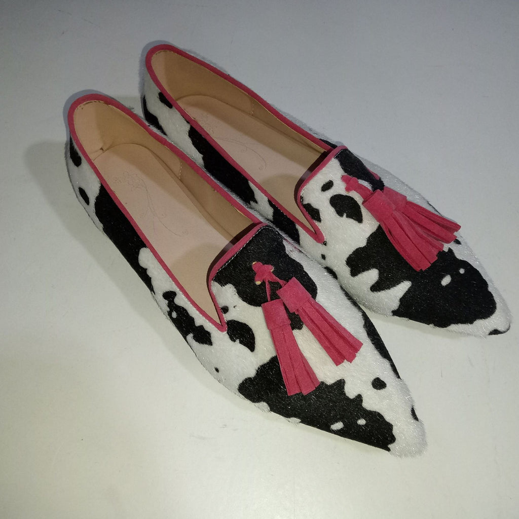 Cow print tassel pumps for women by FitiqueFit, casual slip-on footwear with stylish cow-print design and tassel details.