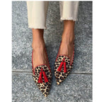 Cow print tassel pumps for women by FitiqueFit, casual slip-on footwear with stylish tassel details and comfortable design.