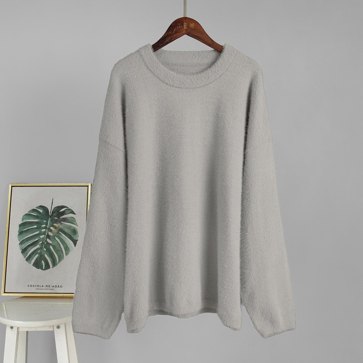 Bella Mia crew neck pullover sweater in solid color, perfect for autumn and winter, featuring a loose, casual fit.