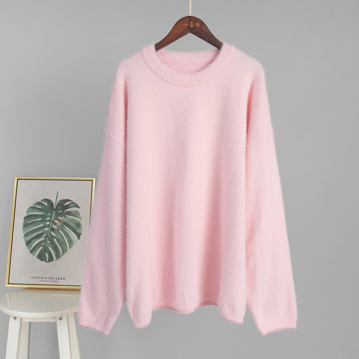Bella Mia crew neck pullover sweater in solid color, featuring a loose fit for casual autumn and winter wear.