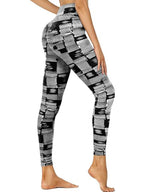 Black and white barcode print cropped high-waisted activewear leggings by FitiqueFit, shown on a model.