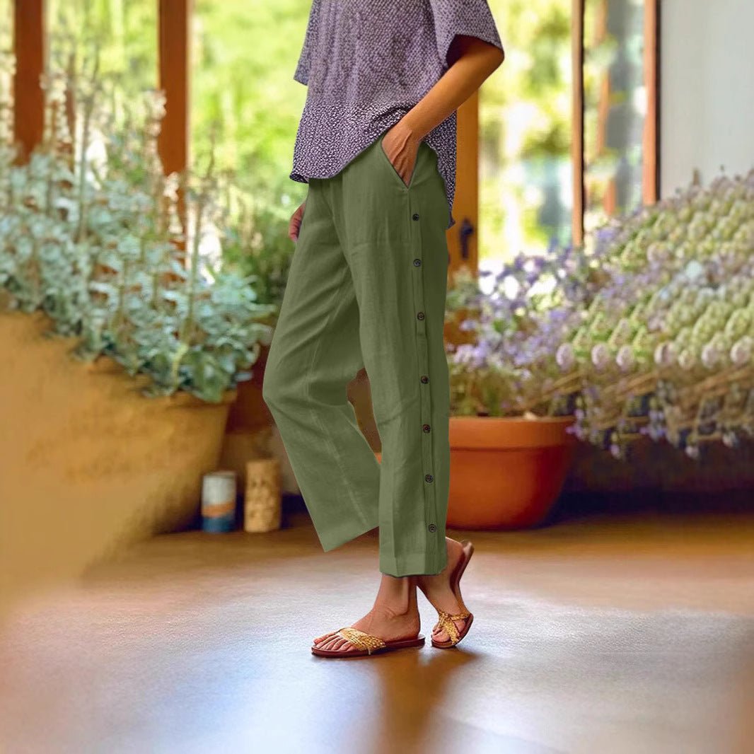 FitiqueFit casual cropped pants with decorative buttons along the side seams, showcasing a stylish and comfortable design.