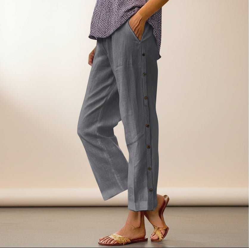 FitiqueFit casual cropped pants with decorative buttons along the side seams, showcasing a stylish, relaxed fit and detailed design.