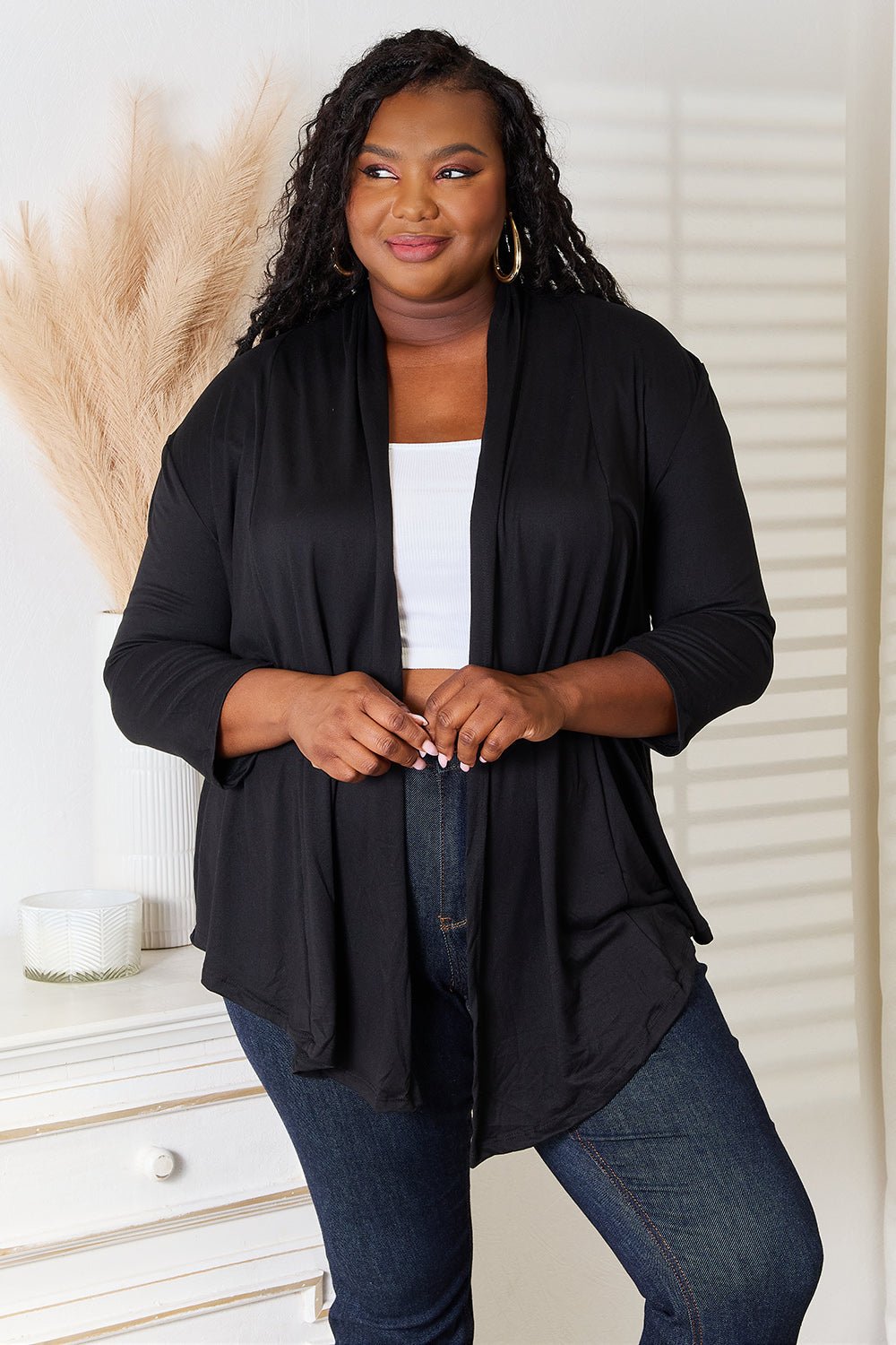 Women's lightweight draped open-front cardigan with 3/4 sleeves, from Plush Fashion Hub, styled casually in a full-length view.