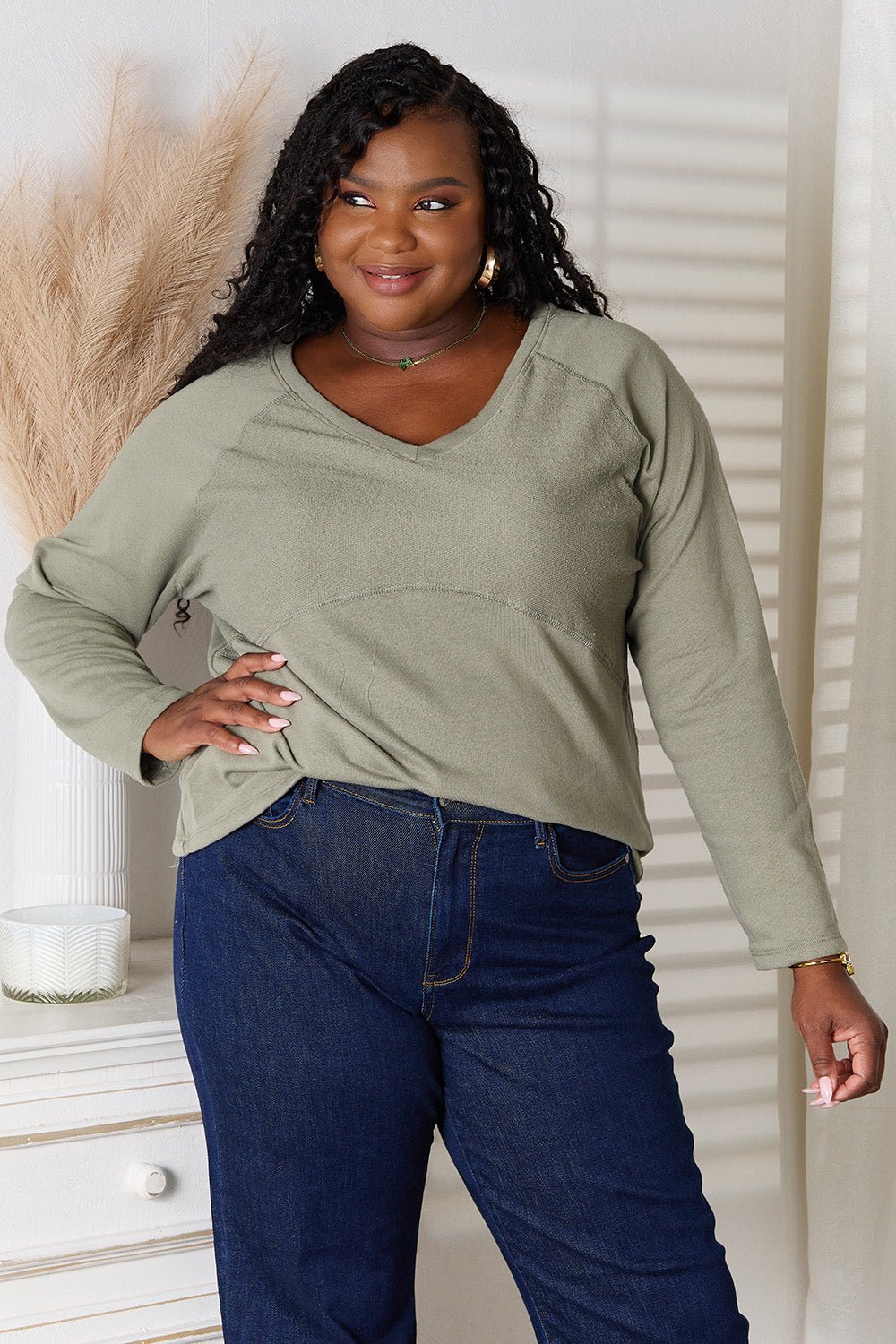 Women’s V-neck long sleeve cotton blend T-shirt by Plush Fashion Hub, shown in a neutral color, casual and comfortable fit.