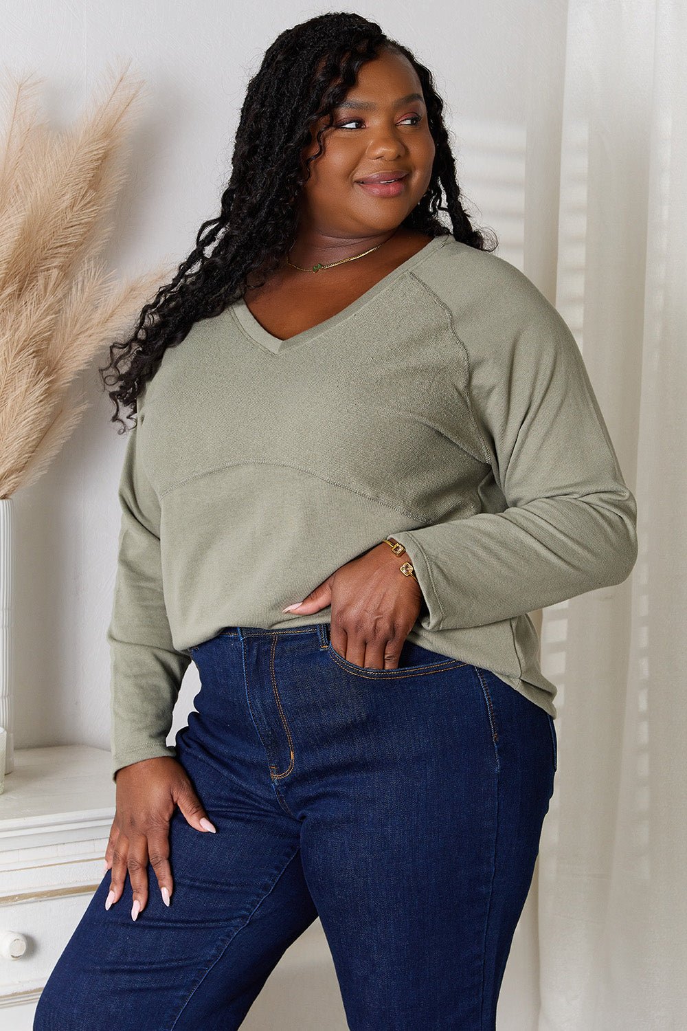 Women’s V-neck long sleeve cotton blend T-shirt by Plush Fashion Hub, shown in a full-length view.