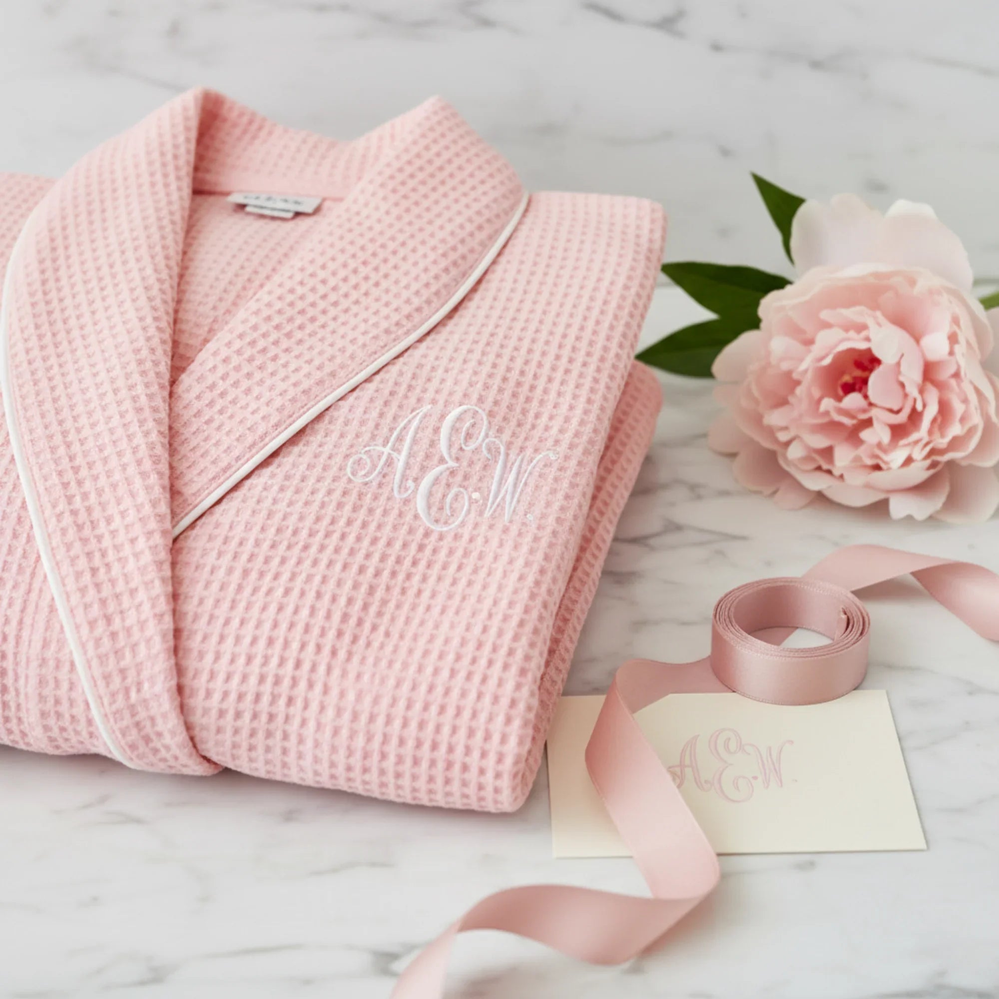 Women’s lightweight waffle piping bathrobe by Lotus Linen, spa-style comfort, soft fabric, and cozy fit in the image.